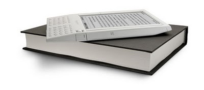 Image of a book and an Amazon Kindle reader.